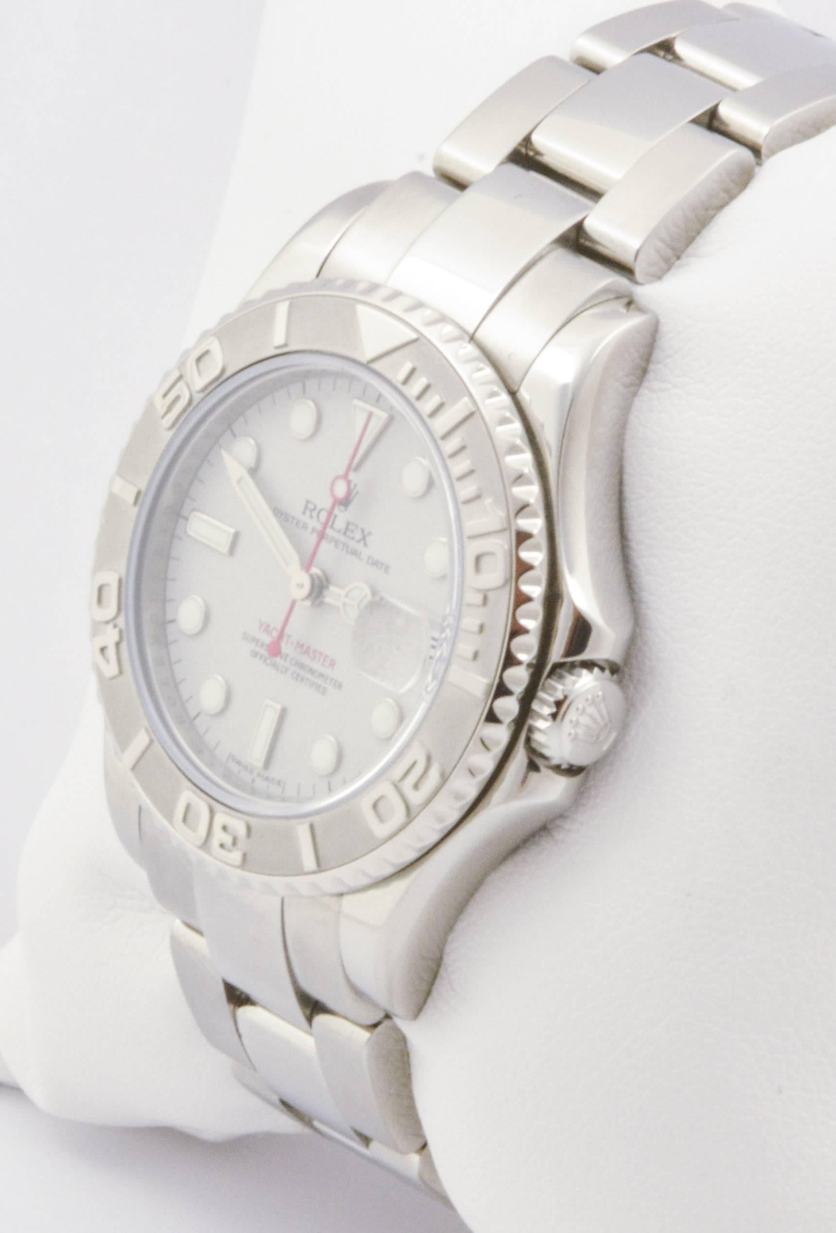 Stainless steel and platinum combine beautifully with white dial markers, a rotating bezel, auto movement, and an Oyster style bracelet in this unforgettable, certified pre-owned 35mm Rolex watch. Reference #168622.