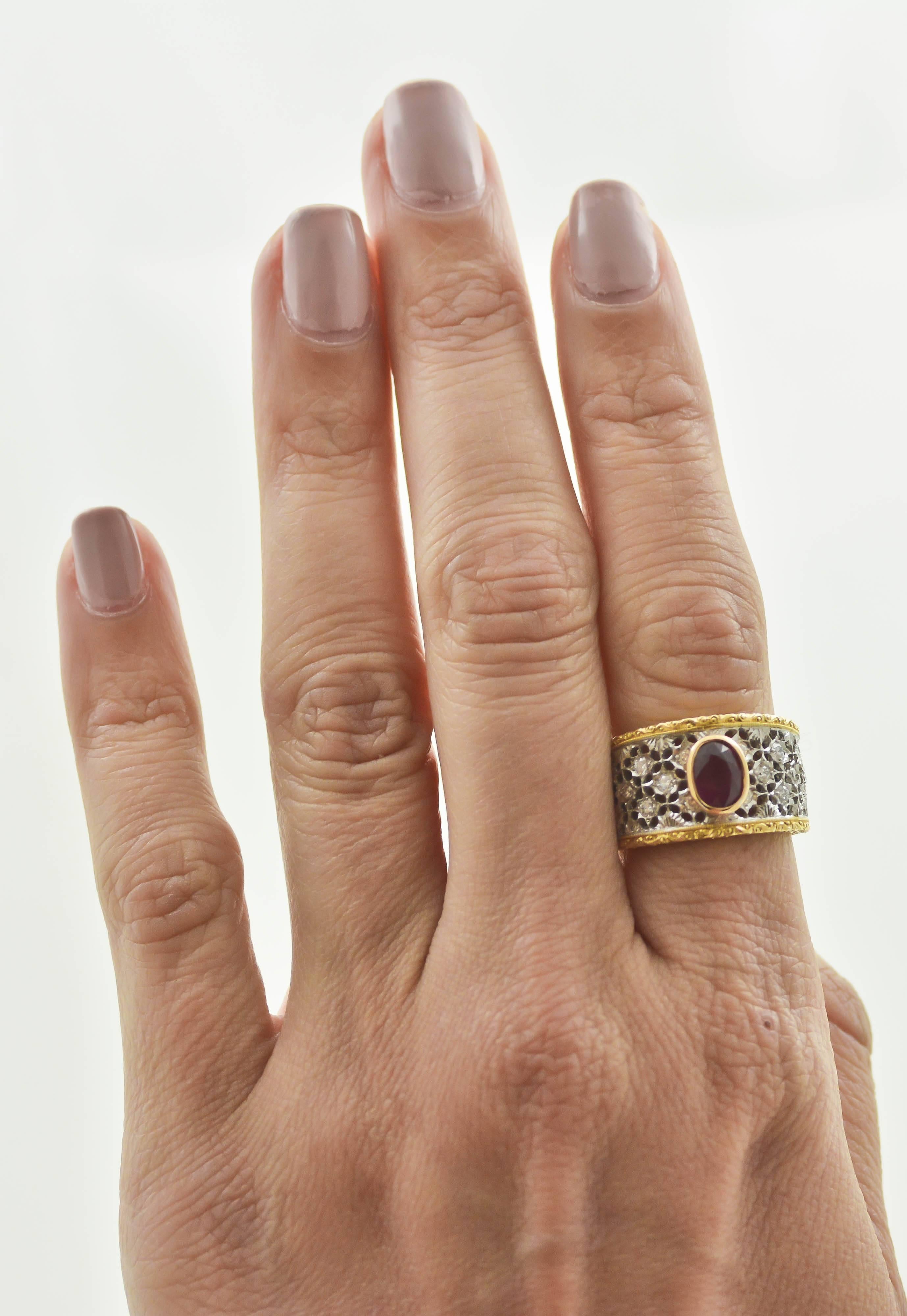 For the woman who loves wide rings, this elegant and royally fashionable ring designed by Italian Maini Gioielli, is precisely the one to please. A 1.20 carat, oval, brilliant-cut, deep red ruby is the focal point of this stunning ring. It is