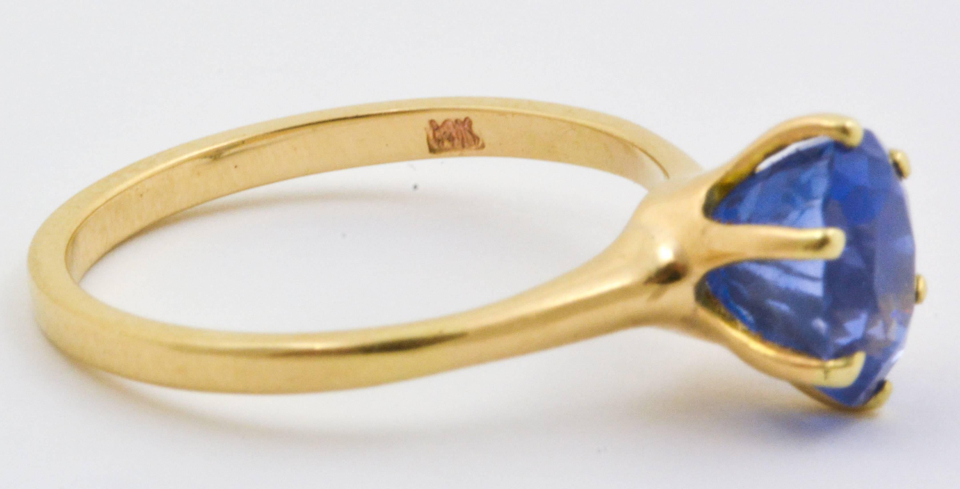3.01 Carat Oval Blue Sapphire 14 Karat Yellow Gold Ring 2