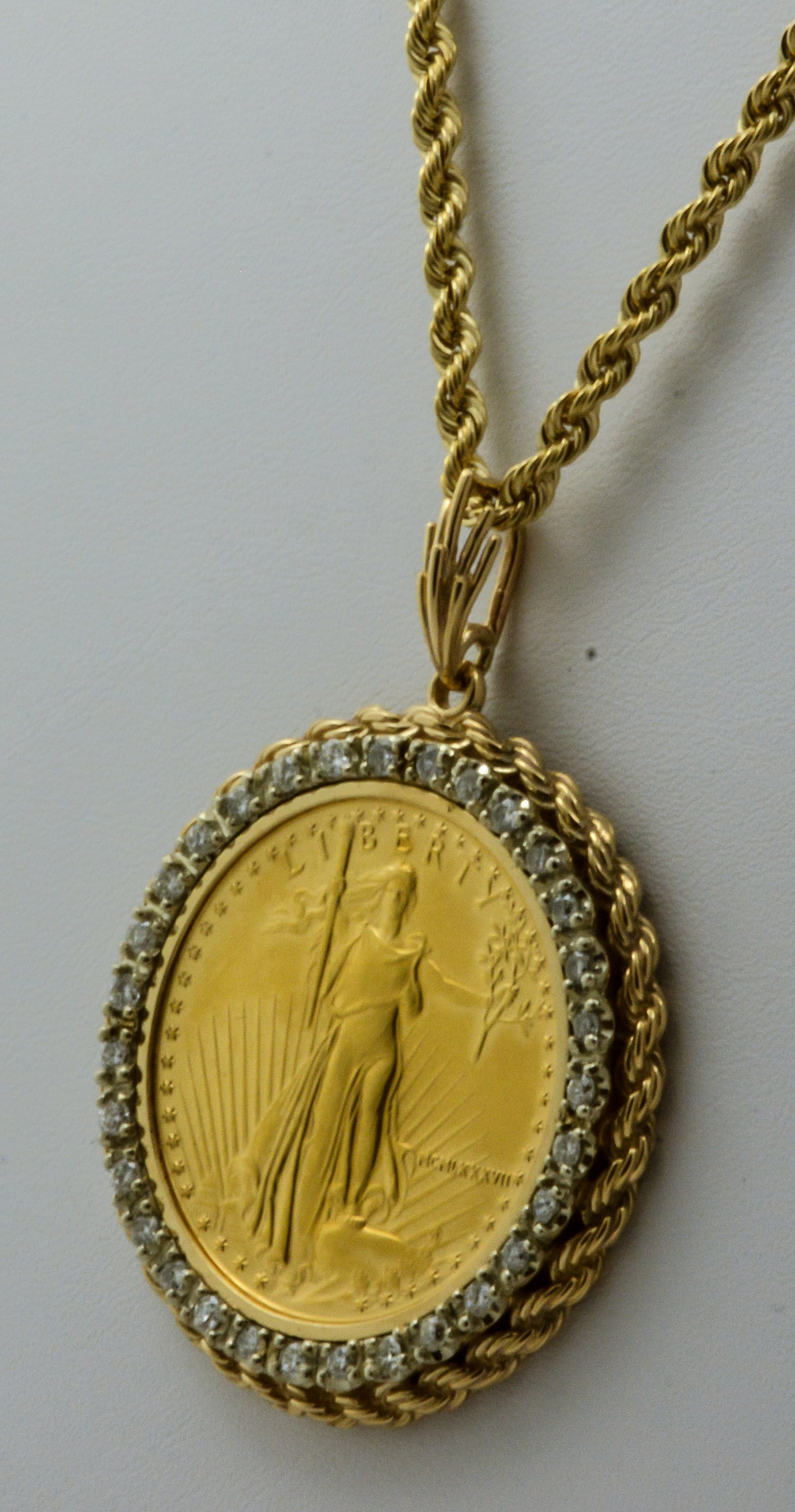 gold coin pendant with diamond bezel 