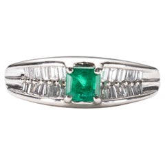 Bague en platine avec émeraude et diamant : bijou d'occasion de 0,40 carat, taille 6,25
