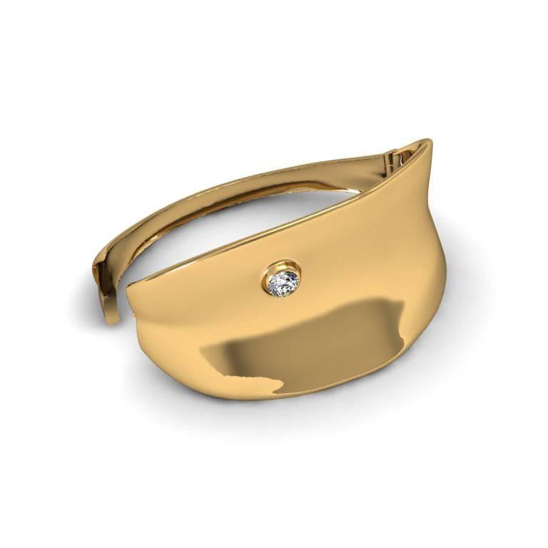 The organic curves of this bracelet fold around your wrist naturally. The added gem seems to have fused with the wing motive. A true signature piece.