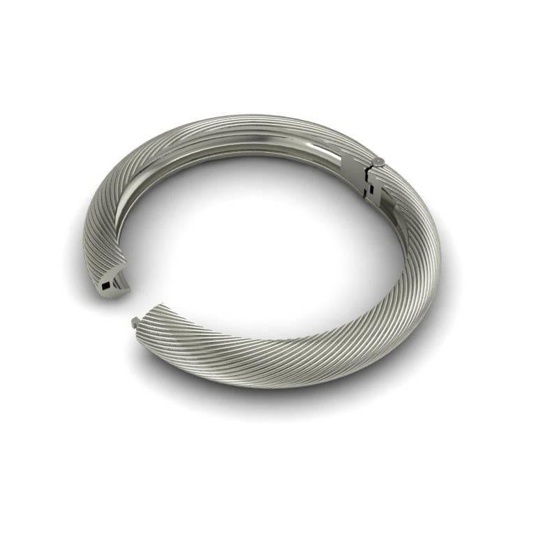 A bold and textured bracelet that oozes simplicity and style. This piece adds a modern elegance to even the most simple of outfits but can be worn both formally and informally.