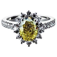 Yellow Diamond GIA Certified 1.64 Carat set in 18Kt White Gold Ring
