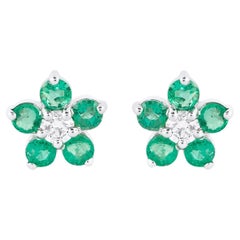 18 Karat Gold 1.28 Carat Diamond and Emerald Flower Modulation Earrings