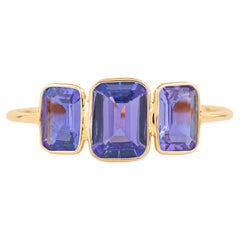 Anello con tre pietre di tanzanite in oro 18 carati da 1,7 carati