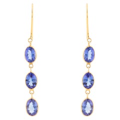 Contemporary Oval-Cut Blue Sapphire Three-Stone Drop Earrings in 18K Yellow Gold