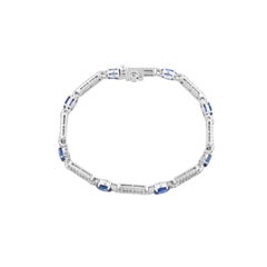 Bracciale a maglie in oro bianco 18 carati in stile Art Déco con zaffiro blu taglio ovale e diamanti