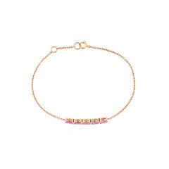 Bracciale minimalista con zaffiro rosa naturale ovale, incastonato a castone, in oro rosa 18 carati