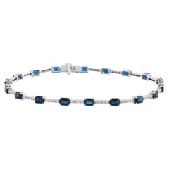Klassisches Armband mit blauen Saphiren im Smaragdschliff und Diamanten, 18 Karat Weißgold