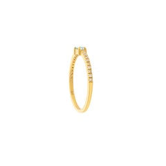 Contemporary Baguette Cut Aquamarine & Diamond Ring in 18 Karat Yellow Gold Band