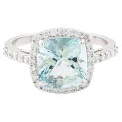 Cushion Cut Aquamarine & Diamond Halo Solitaire Ring in 18K Gold with Pavé Band
