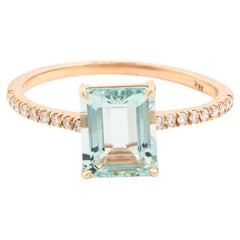 Minimalist Emerald Cut Aquamarine Solitaire Ring with Pavé Diamonds in 18K Gold