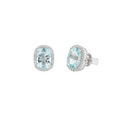 Elongated Cushion Aquamarine & Diamond Halo Stud Earrings in 18 Karat White Gold