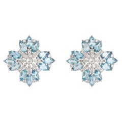 Orecchini a bottone contemporanei con acquamarina blu e diamanti a forma di fiore, in oro 18 carati