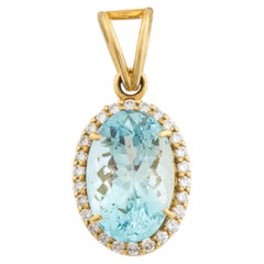 Classic Oval Natural Aquamarine & Diamond Halo Pendant in 18K Yellow Gold Bail