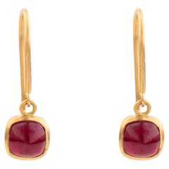 Contemporary Cushion Cabochon Ruby Bezel Set Dangle Earrings in 18K Yellow Gold