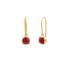 Contemporary Cushion Cabochon Ruby Bezel Set Dangle Earrings in 18K Yellow Gold