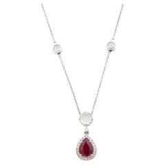 Collar moderno con colgante en forma de gota de oro de 18 quilates, con un rubí de 0,93 quilates con talla de pera y un halo de diamantes