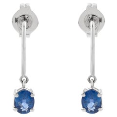 Boucles d'oreilles pendantes de style moderne en or 18 carats, serties de saphirs bleus authentiques de taille ovale à griffes