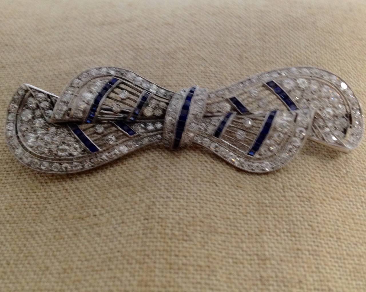 Art Deco Chic and Sophisticated Sapphire Diamond Platinum Lacy Bow Pin 1