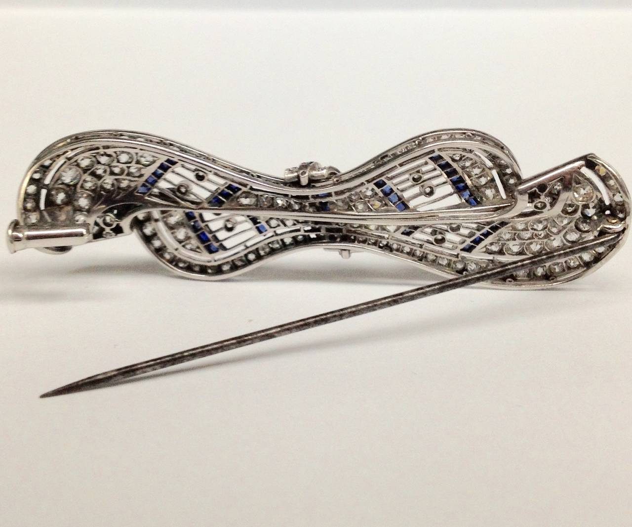 Art Deco Chic and Sophisticated Sapphire Diamond Platinum Lacy Bow Pin 3