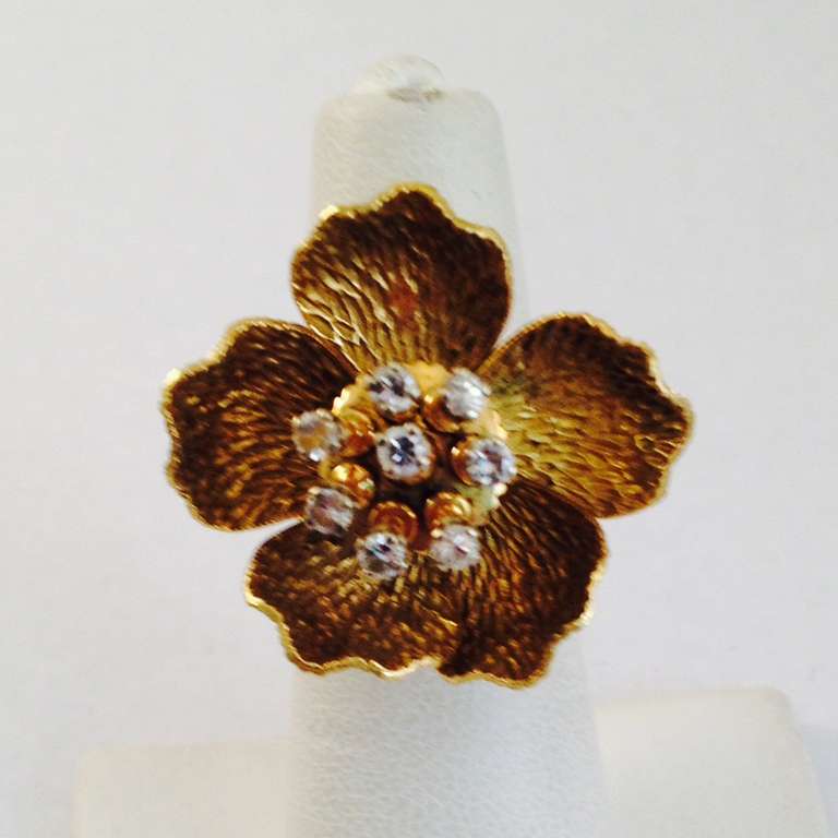 18kt gold and diamond flower ring with moveable petals and tremblant diamonds. Petals and diamonds are all moveable. Made In France in the 1950s.