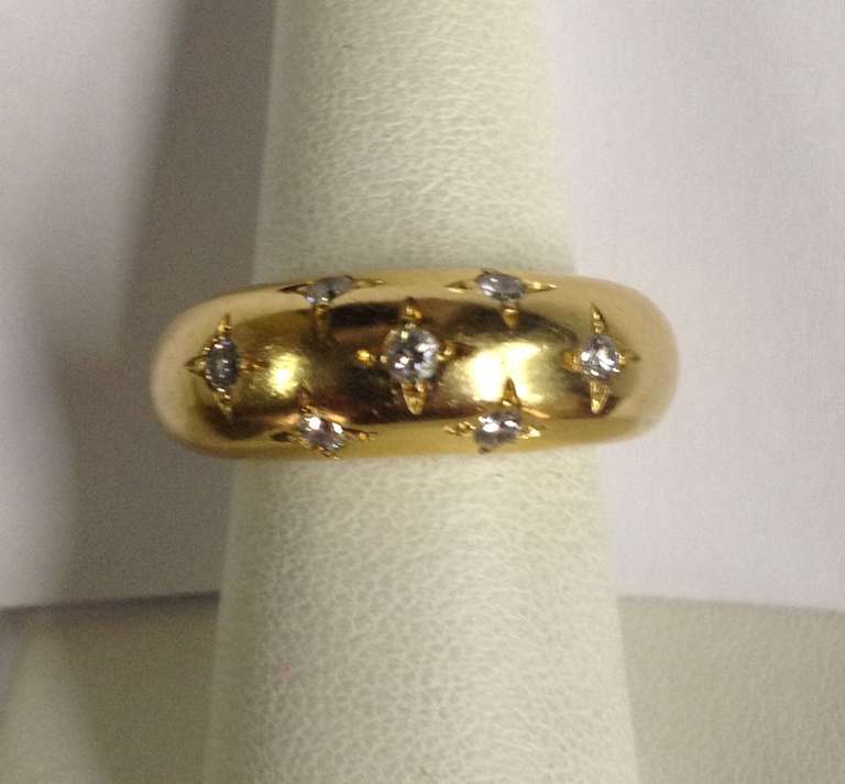 18kt yellow gold and diamond bubble ring consisting of 7 high quality full cut diamonds weighing .50 cts  beautiful contour effect to finger when worn made in france signed CHAUMET PARIS