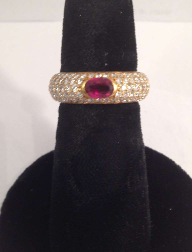 Women's 1980's H.Stern Gold, Ruby And Diamond Encrusted Rounded Effect Band.