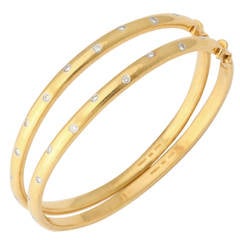1990s Tiffany & Co. Etoile Collection Pair Of Heavy Diamond Gold Bangles