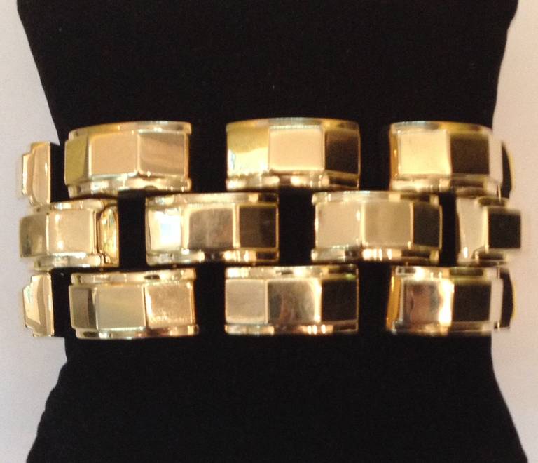 14kt yellow gold High polish 1940's tank bracelet with beautiful three dimensional faceted block design signed by TIFFANY & CO.