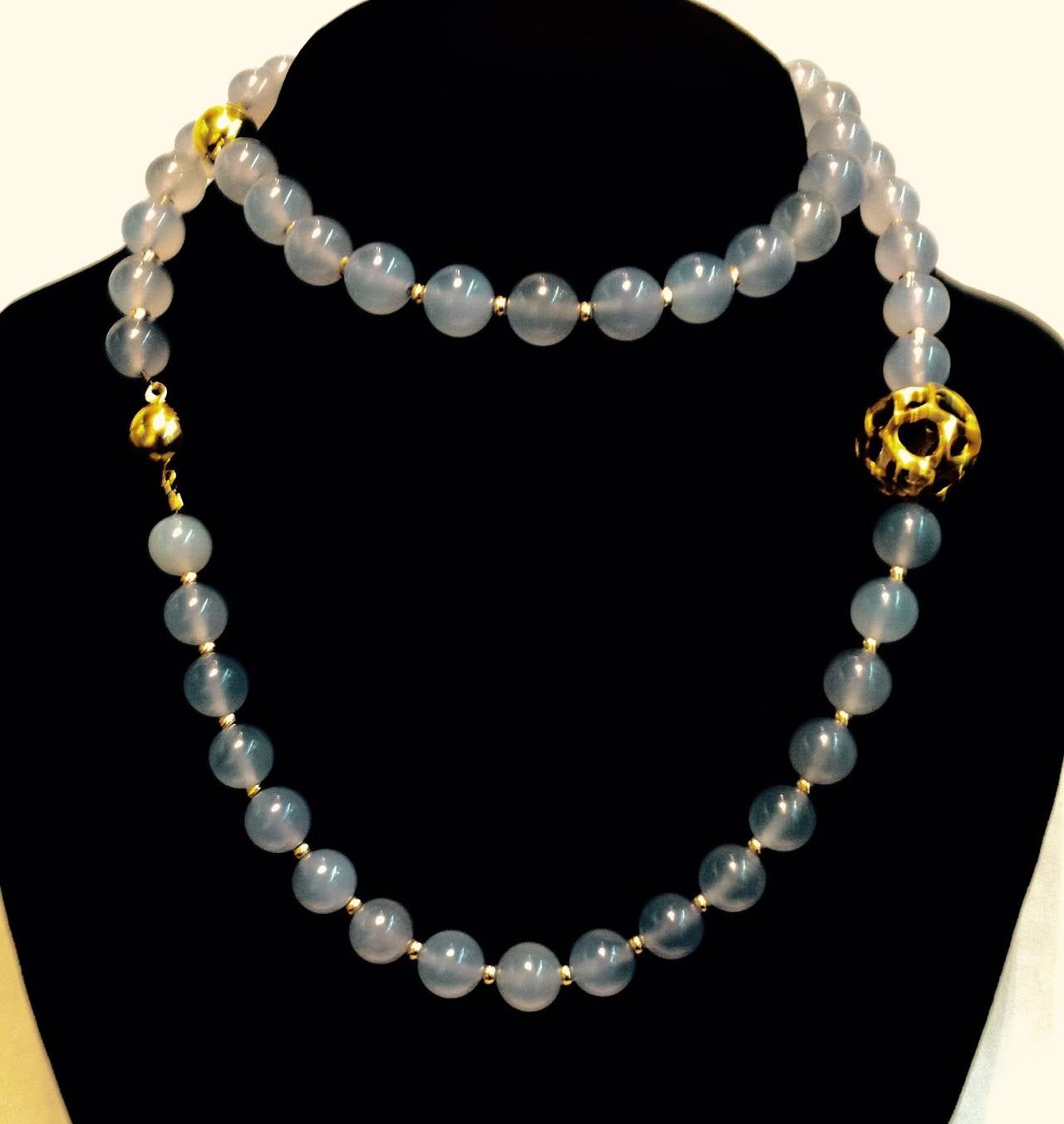 18kt yellow gold Highly Iridescent Blue Chalcedony High Quality 30 Inch Chain Necklace, Further Designed With 18kt Yellow Gold Spacers and 3 yellow gold balls, in which one is a magnetic clasp and one larger open work Artisan Ball crater design