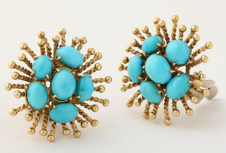 18kt European made gold sputnik earclips embellished with 2 clusters of beautiful natural color cabochon style Turquoises & further exhibiting beautiful rope design workmanship on the gold section of earrings furthermore tipped of with 18kt yellow