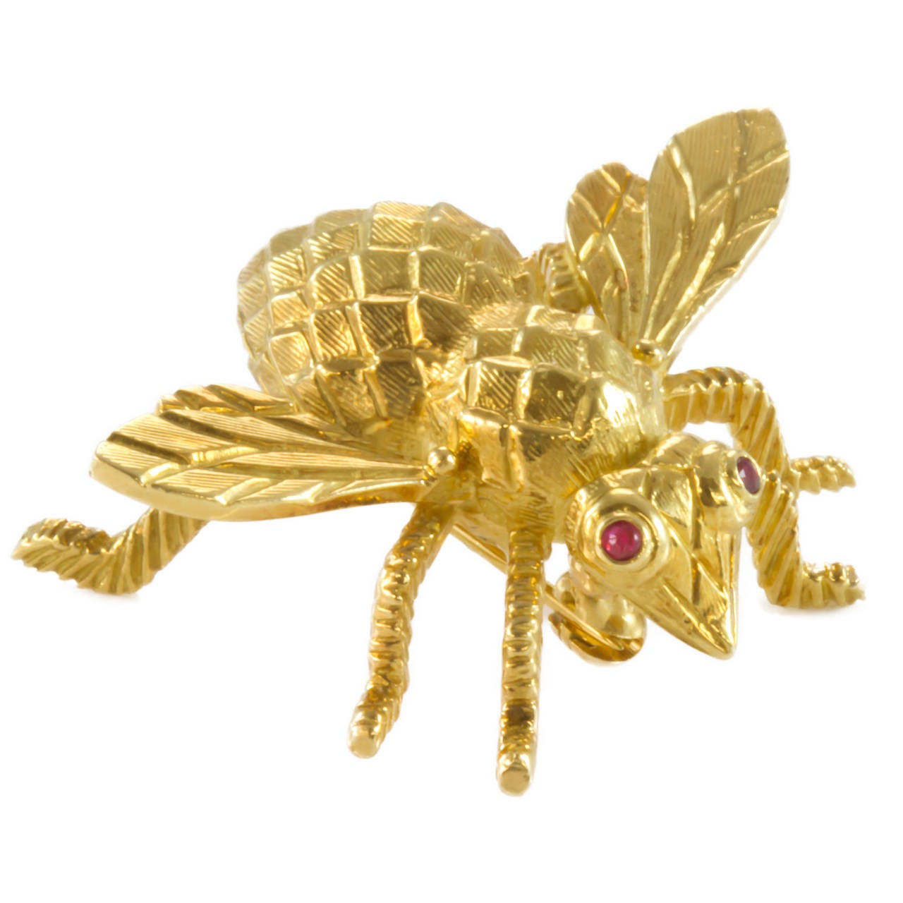 Hand cast bee has texture on both the body and wings. Excellently cast, and hand made in 18K yellow gold. Bezel set rubies were cast for eyes, approximate weight of 0.03. Although bee does not currently have a loop for a necklace, one could be