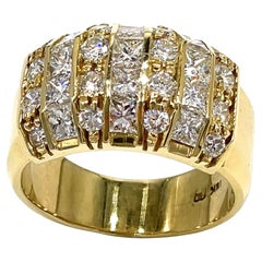 Mehrreihiger Vintage-Ring aus 18 Karat Gelbgold mit Prinzessinnenschliff und runden Diamanten