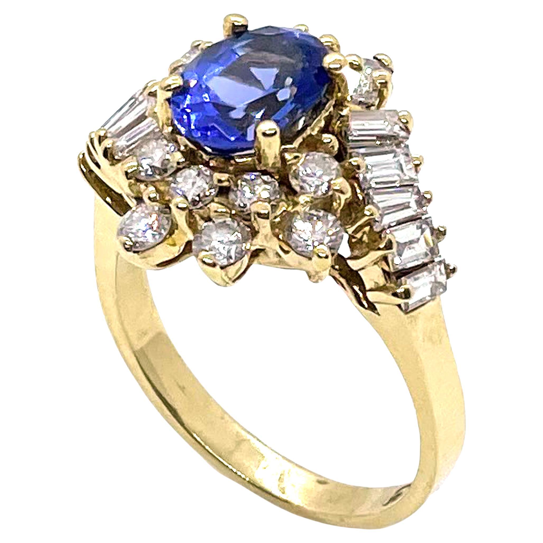 Bague vintage en or 14 carats avec tanzanite ovale et diamants ronds et baguettes