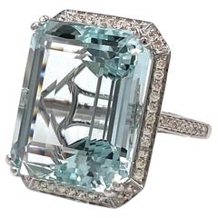 23.93 Carat Step Cut Aquamarine in 14K White Gold Ring Setting, Halo Diamonds