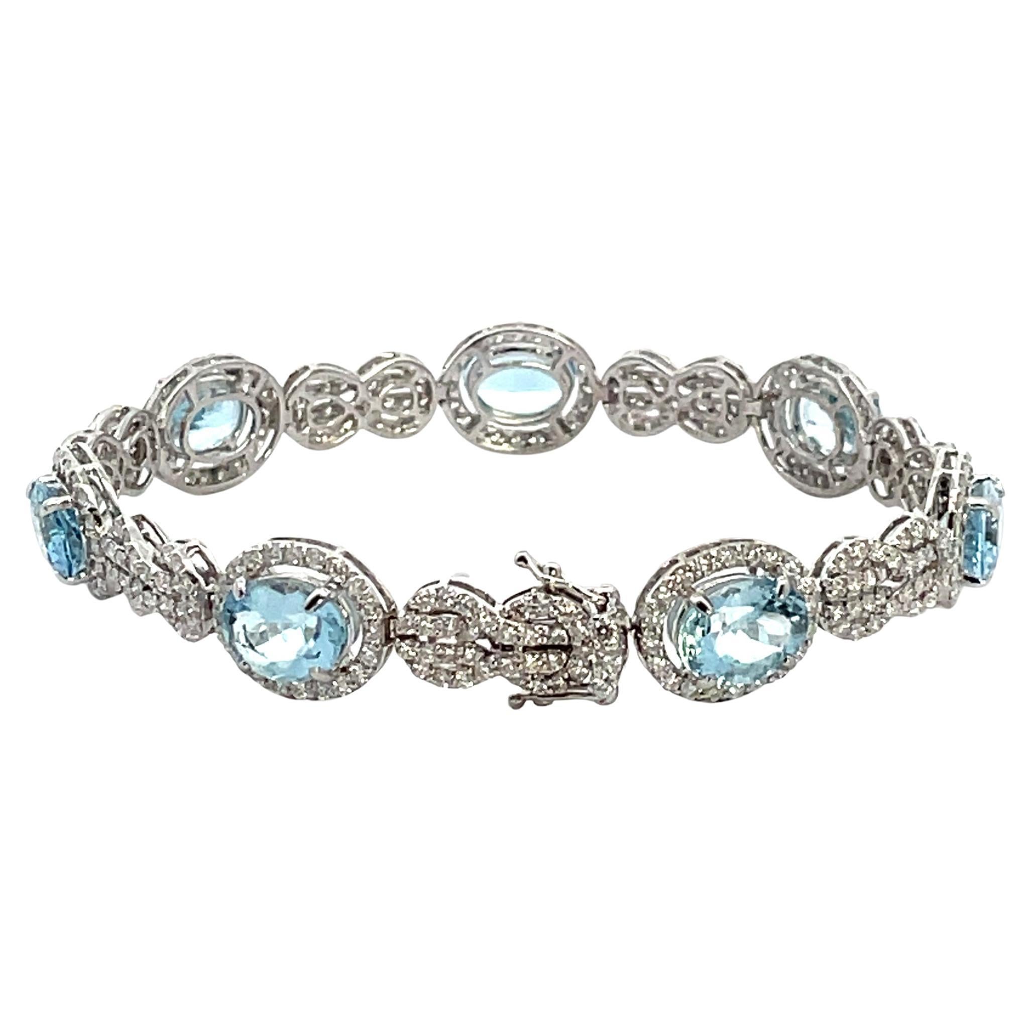 Pulsera Oro Blanco 18K Aguamarinas Ovaladas 10.91 Quilates
Diamantes Redondos 4.63 Quilates