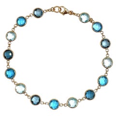 14K Gelbgold Multi Hue Round Blue Topaz Riviera Armband mit Extender