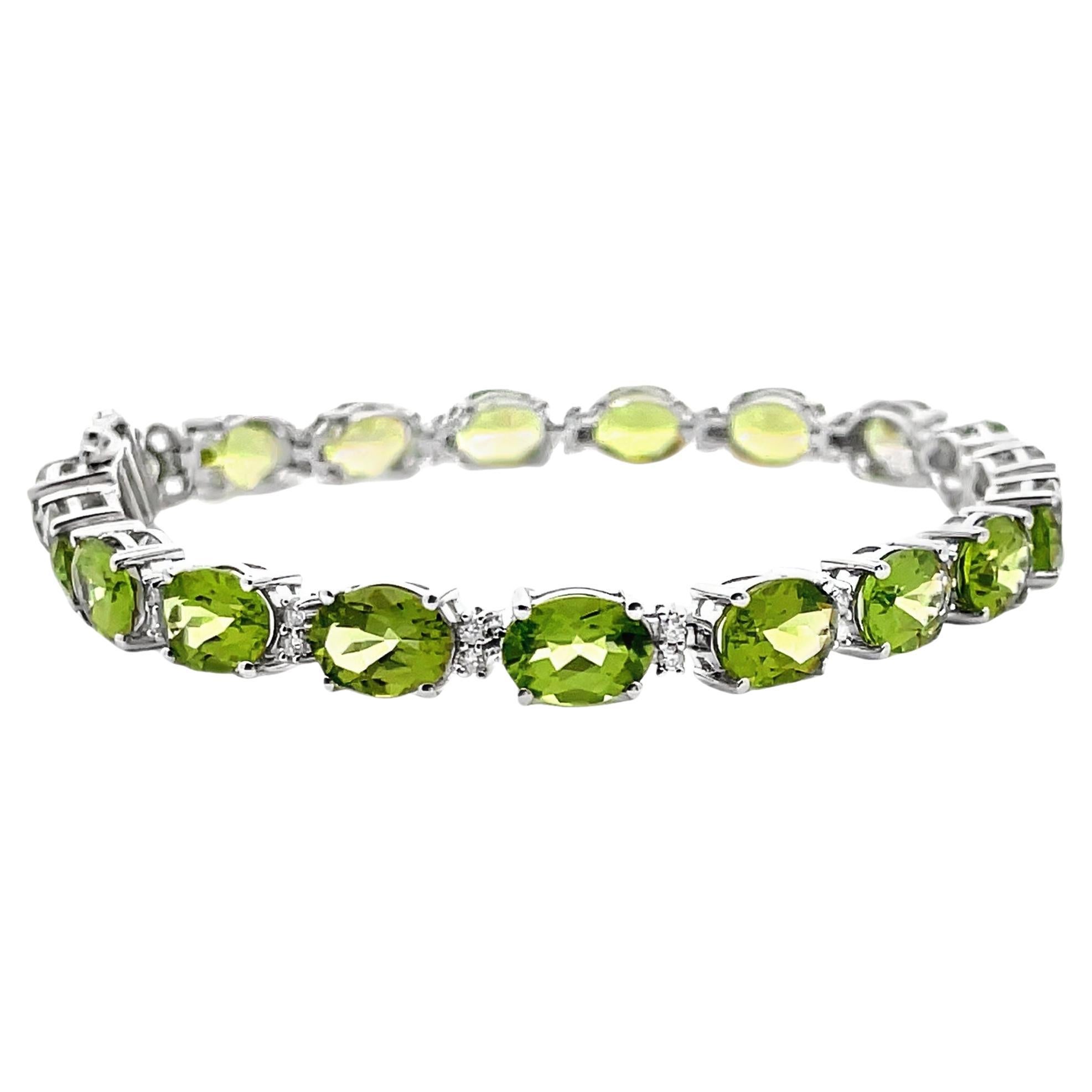Oval Peridot and Diamond Bracelet Prong Set in 14K White Gold with Safety Latch