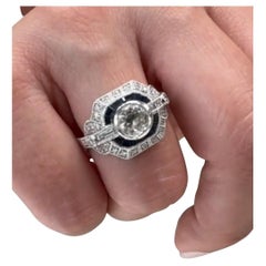 Platinum Sapphire
Diamond Art Deco Inspired Shield Ring, Round Center Diamond Platinum Sapphire
Diamond Art Deco Inspired Shield Ring, Round Center Diamond