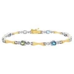 Armband aus 14-karätigem Zweifarbgold mit Diamanten und mehrfarbigen Halbedelsteinen
