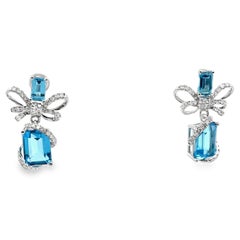 14K White Gold Ribbon Bow Earrings with Blue Topaz and Diamonds