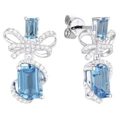 14K White Gold Ribbon Bow Earrings with Blue Topaz and Diamonds