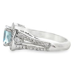 Platinum Vintage Inspired 1.30 Carat Blue Topaz Ring and 0.40 Carat Diamonds