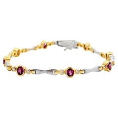 14K Two Tone Gold Bracelet with Round Diamonds and Oval Rhodolite