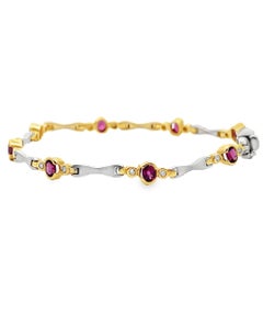 14K Two Tone Gold Bracelet with Round Diamonds and Oval Rhodolite