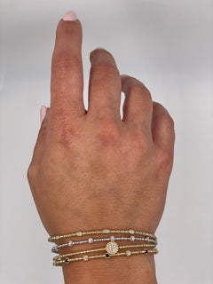 14K Yellow Gold Five Station 0.13 Carat Diamond Flexible Bangle Bracelet