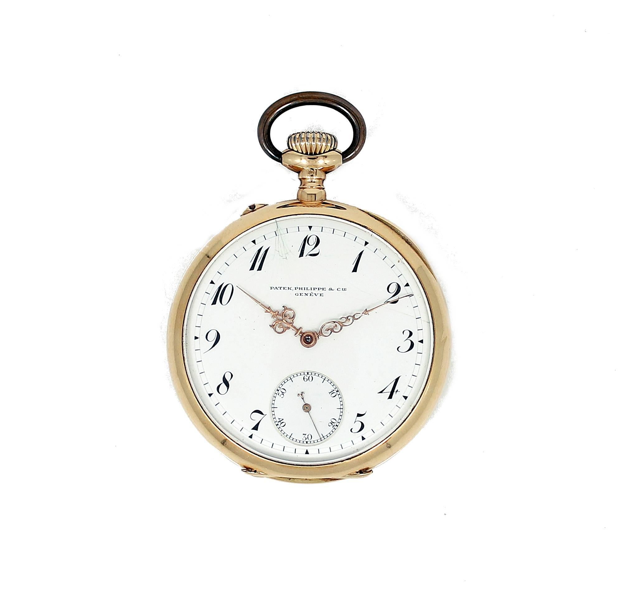 18K Yellow Gold Patek Philippe Pocket Watch Open Face. This Pocket Watch was  Manufactured in 1907 and Sold in 9/30/1908. It has a white enamel dial and gold hands.(The dial has minor damage) Case#251.591 and Movement#143.623 Comes with the Extract