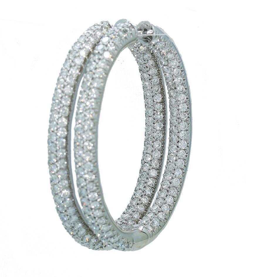 These beautiful inside / outside hoop earrings hold approximately 300 round brilliant cut diamonds set in a 3 row pattern. Diamonds are near colorless with SI-VS clarity which brings out such a great sparkle. Earrings have a width of 5mm. From top